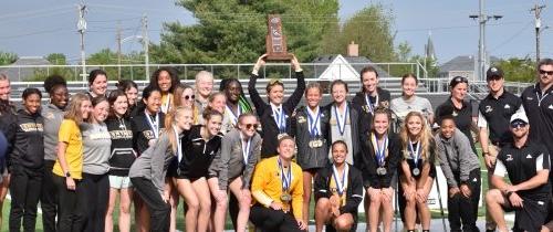 Women's Cross Country Team celebrating championship